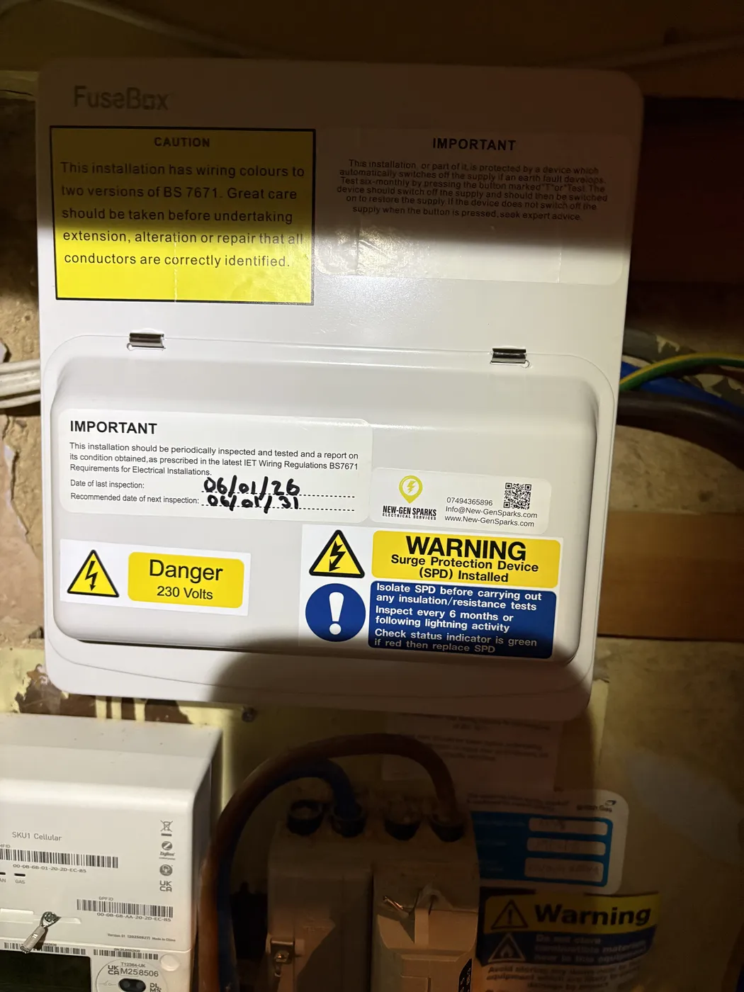 Completed consumer unit in Hammersmith with EICR inspection labels and next-test date
