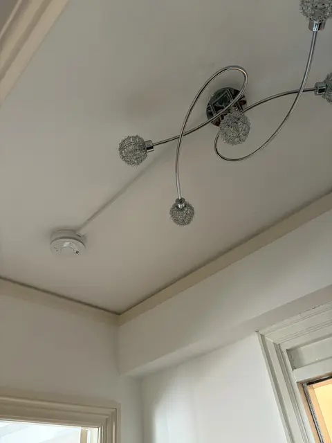 Decorative ceiling light and smoke alarm installed in a Fulham hallway
