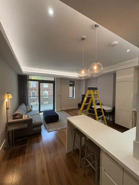LED coving, downlights and feature pendants in an open-plan Bayswater flat