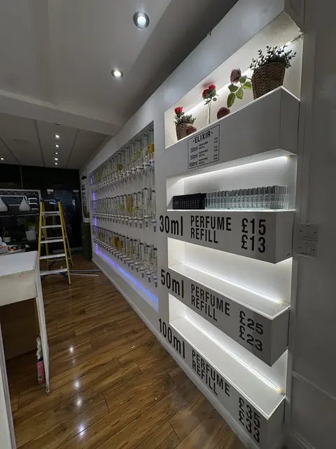 Backlit LED display shelving installed for a retail fit-out in West London
