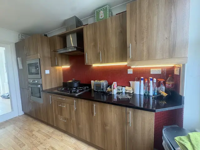 Under-cabinet LED lighting and new sockets in a Chiswick kitchen